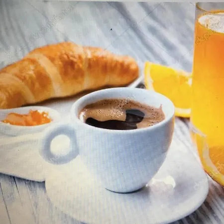 Na Tazzulel E Cafe